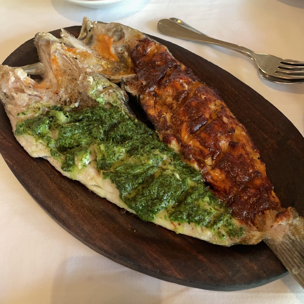 Contramar’s iconic red and green salsa grilled fish, perfectly cooked and bursting with bold Mexican flavors.