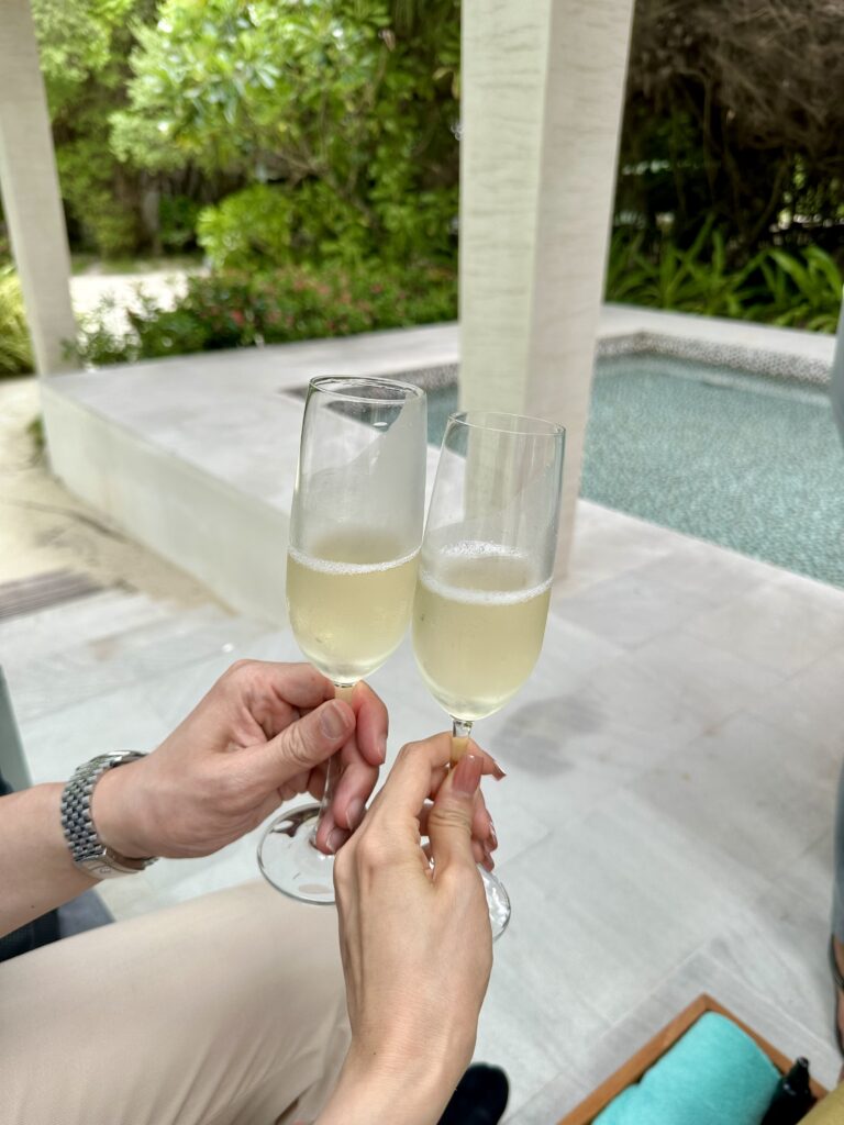An unforgettable check-in experience at Ozen Life Maadhoo – greeted with champagne on arrival as your personal butler assists with your check-in.