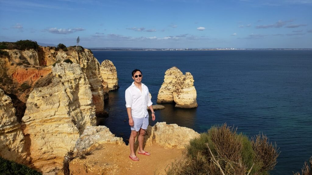 Hiking trail overlooking the sea stacks and cliffs of Ponta da Piedade in Lagos