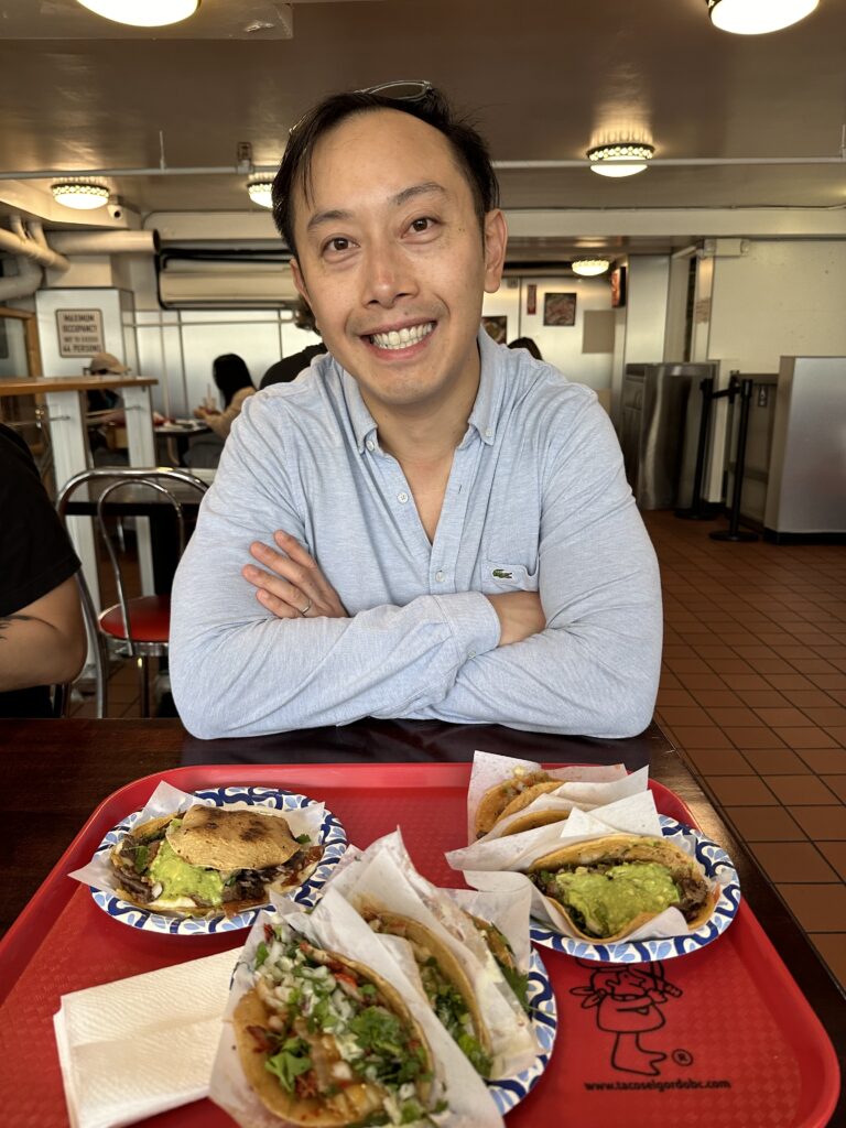 Authentic Mexican street tacos with al pastor served on corn tortillas in San Diego