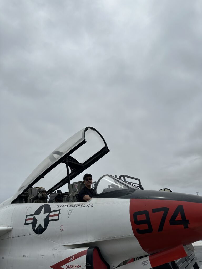 Sitting inside a fighter jet cockpit at the USS Midway Museum in San Diego