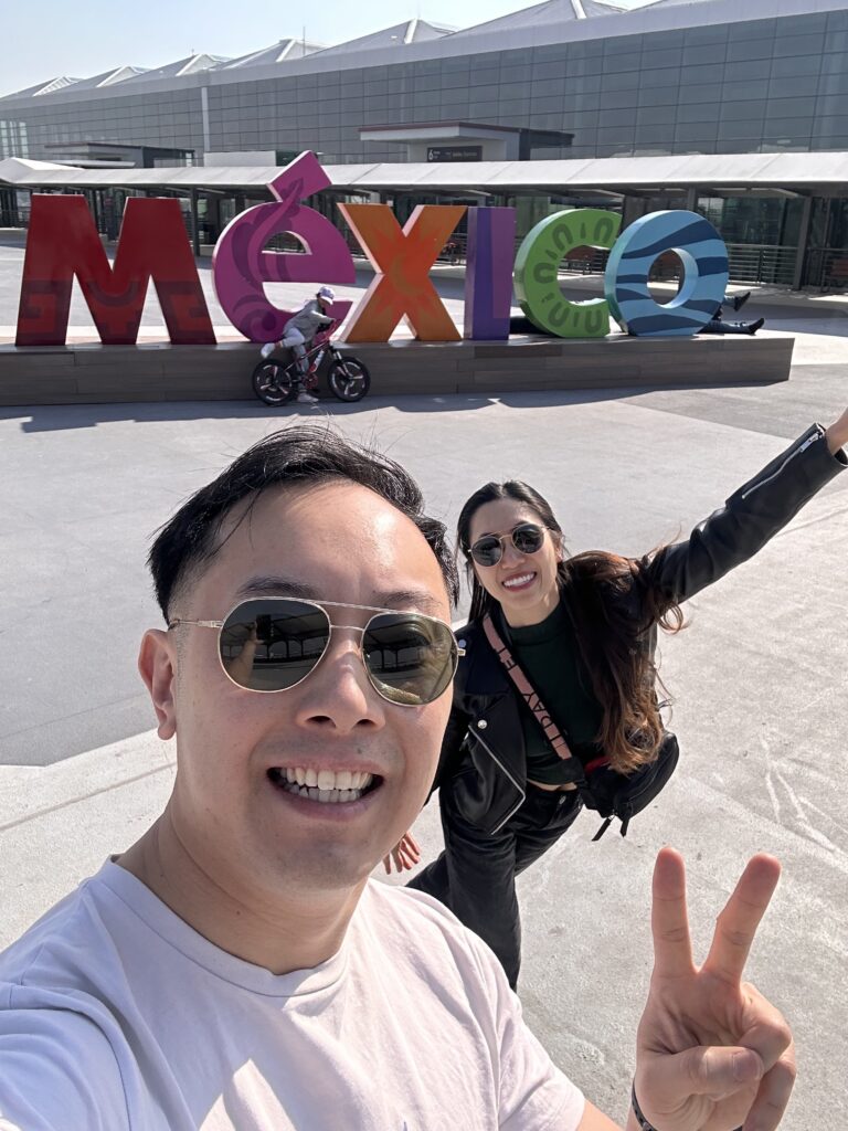 Us in NLU airport in Mexico City soaking in the sun before our flight to Oaxaca City.