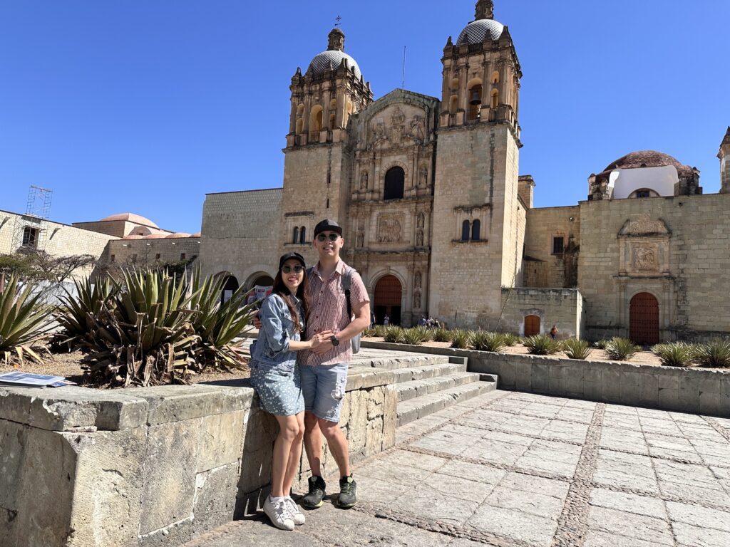 Us enjoying the stunning views in front of the Oaxaca Cathedral, a beautiful colonial landmark in Oaxaca's city center.