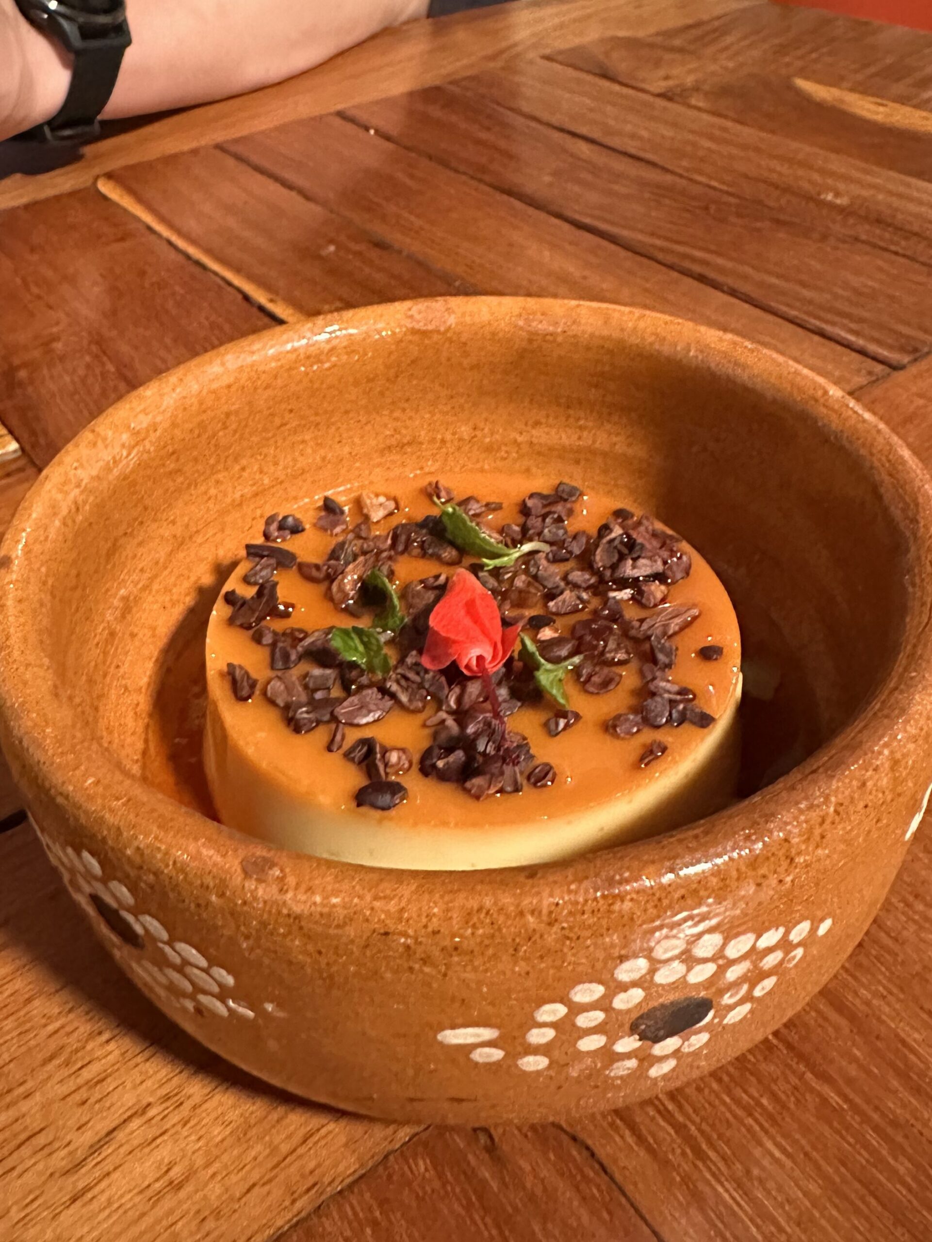 Deliciously creamy Mexican flan dessert, beautifully presented with caramel drizzle.