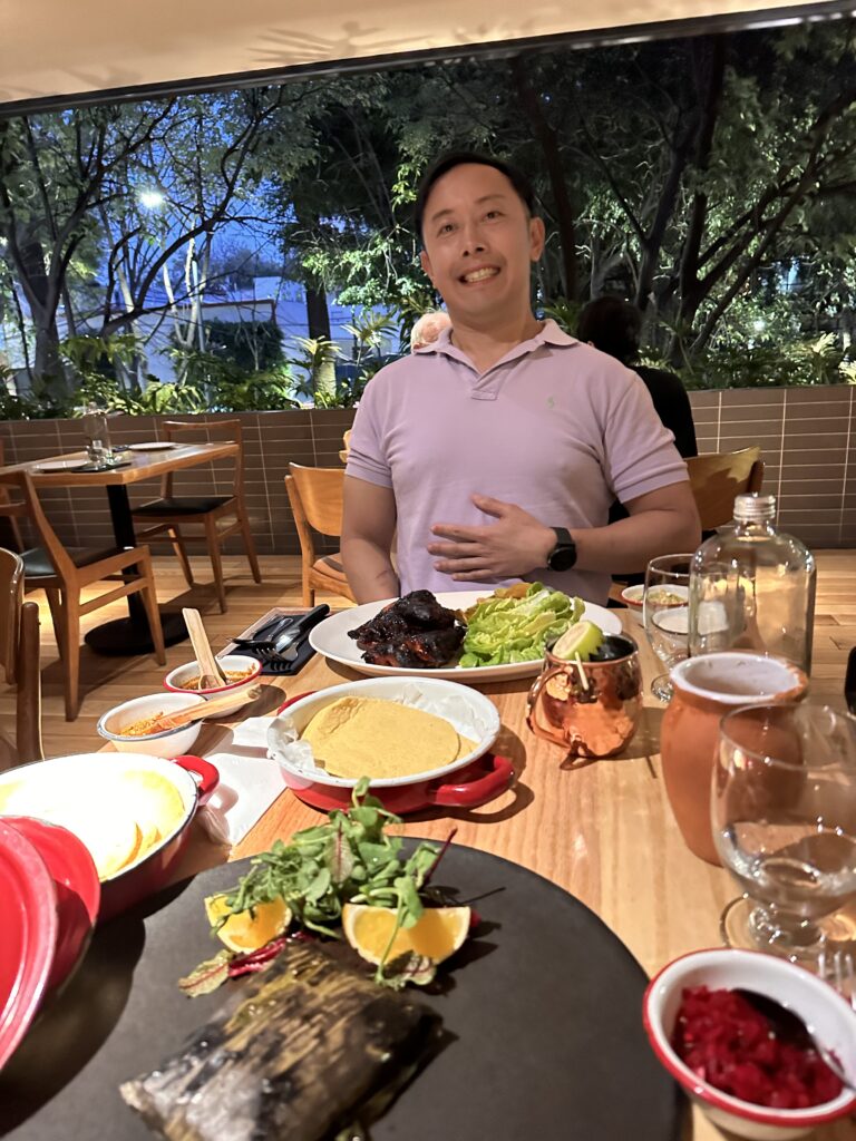 Satisfying meal with grilled chicken and cochinita pibil at La Capital, one of the best restaurants in our 2 week Mexico itinerary