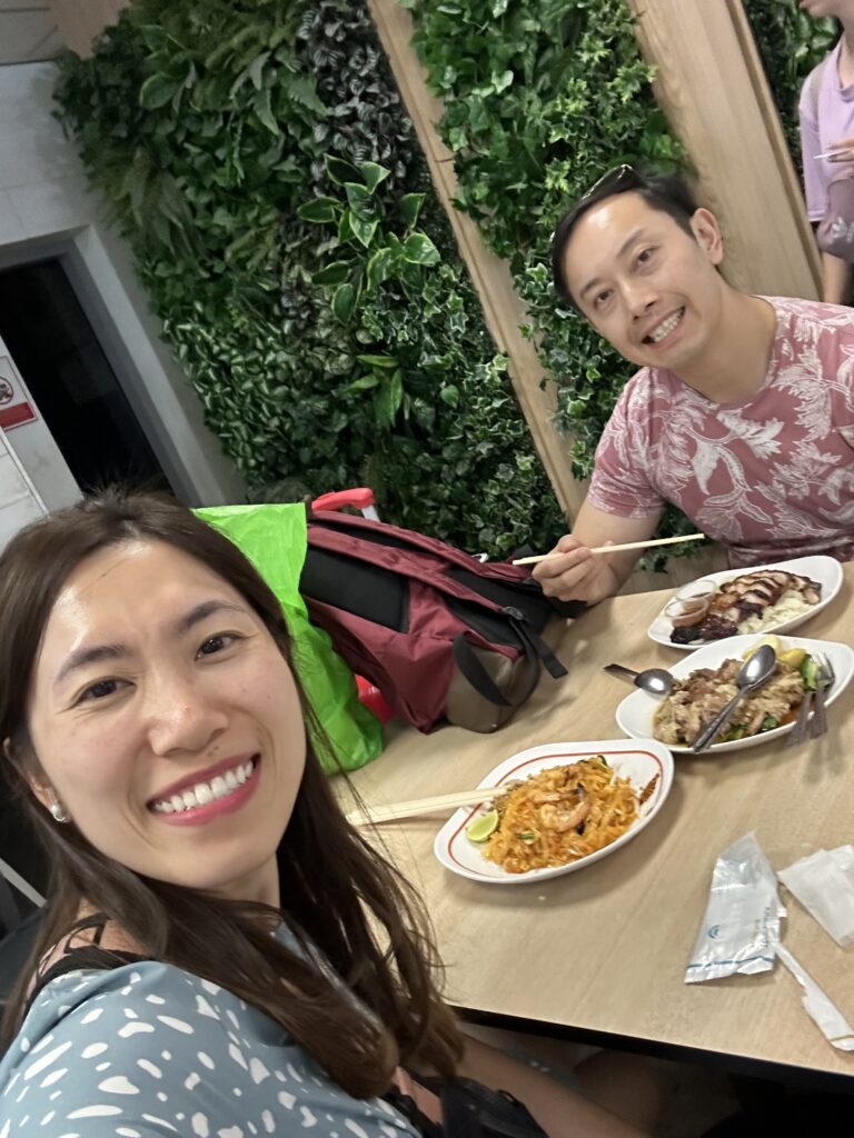 Eating authentic Thai food at Magic Food Point food court in Suvarnabhumi Airport, a popular budget-friendly dining spot for travellers.
