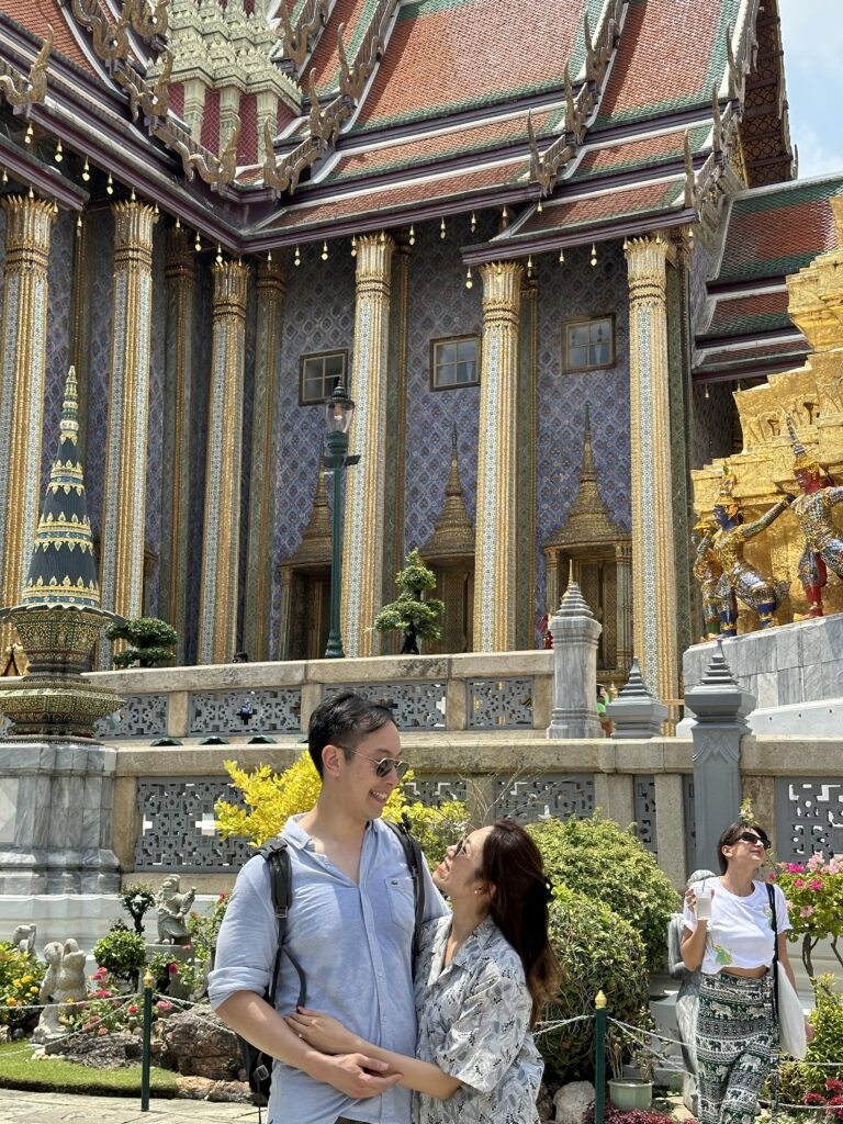 Exploring the stunning architecture and rich history at the Grand Palace in Bangkok, surrounded by intricate details and golden spires. This is one of the top things to do in Bangkok!