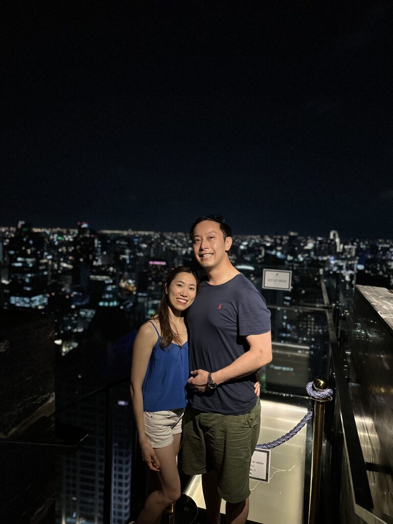 Sipping cocktails high above the city at a rooftop bar, the perfect setting for a memorable evening