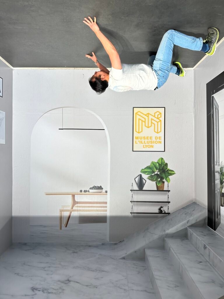 Adults and children alike enjoying the interactive exhibits at the Museum of Illusions in Lyon, with a variety of visual tricks and illusions that engage and entertain.