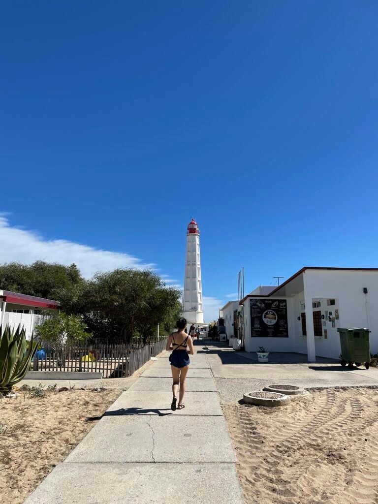 Historic lighthouse marking the southernmost point of mainland Portugal on Farol Island