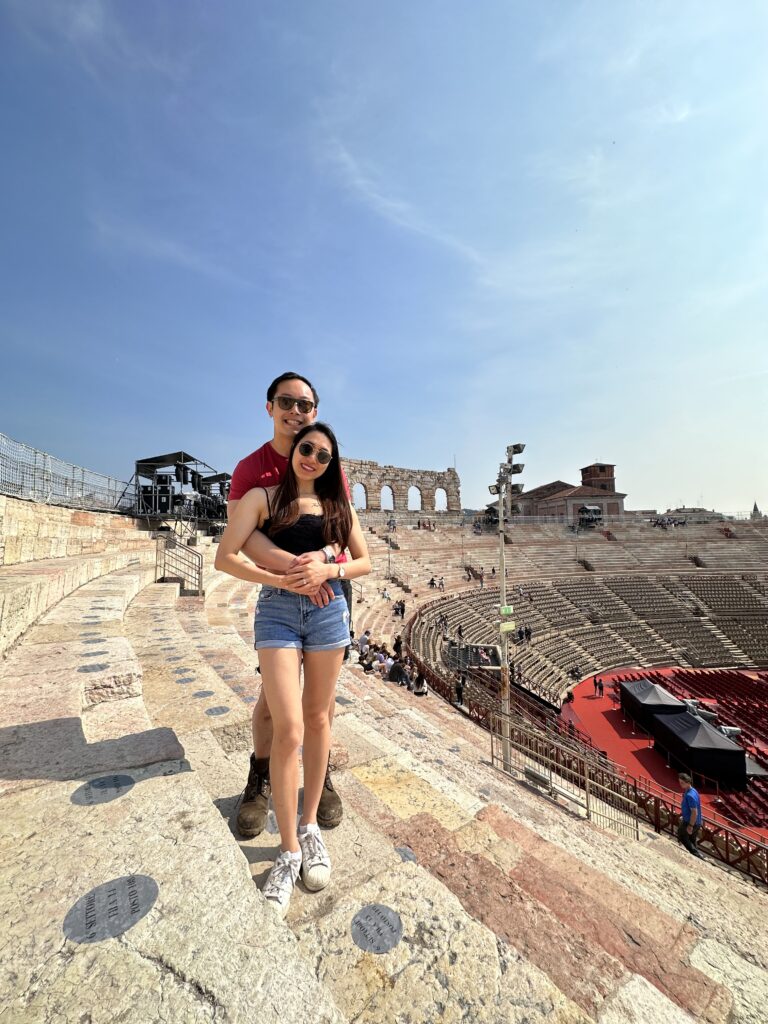 Historic Verona Arena amphitheatre under blue skies in northern Italy