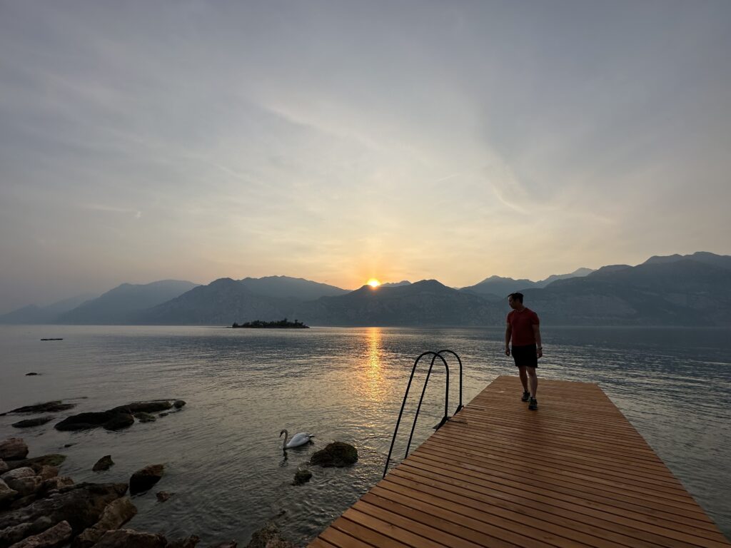 Golden hour view of Lake Garda from a scenic overlook near Malcesine