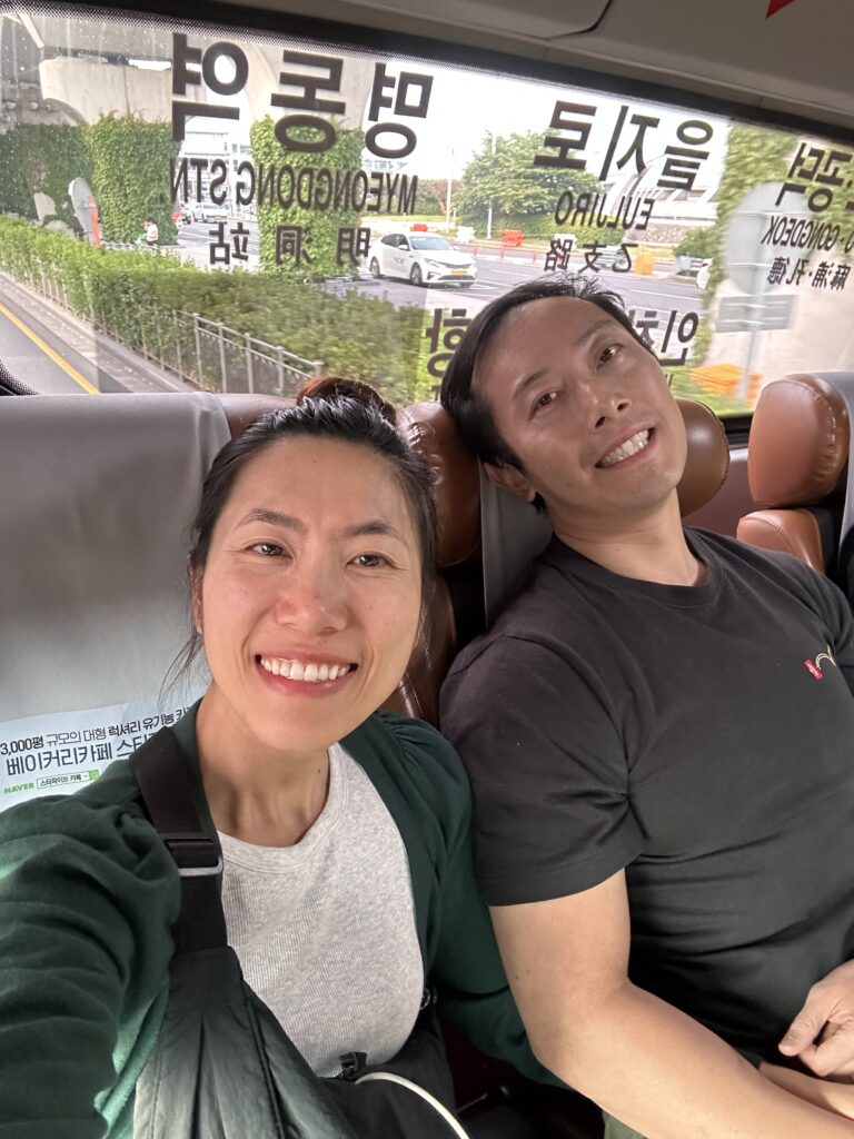 Incheon Airport limousine bus boarding passengers on scheduled airport‑to‑Seoul route