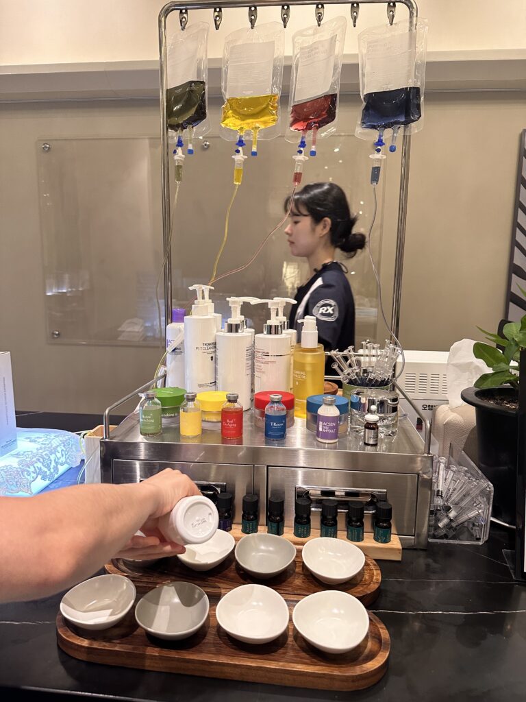 Facial treatment session at Areuke Spa in Seoul, with advanced skin analysis equipment