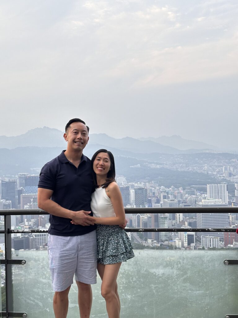 Stunning panoramic view of downtown Seoul from Namsan Mountain, highlighting N Seoul Tower and urban landscape