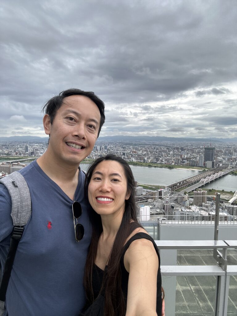 Panoramic view of Osaka city from the Umeda Sky Building’s Observatory, showcasing the urban skyline and modern architecture.
