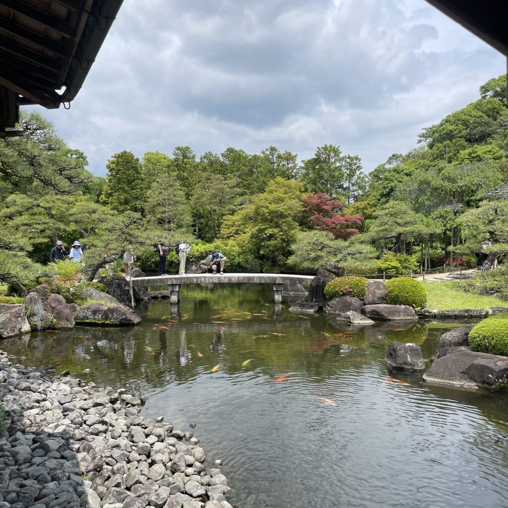 Koko-en Garden featuring koi pond and manicured pine trees in Himeji, Japan