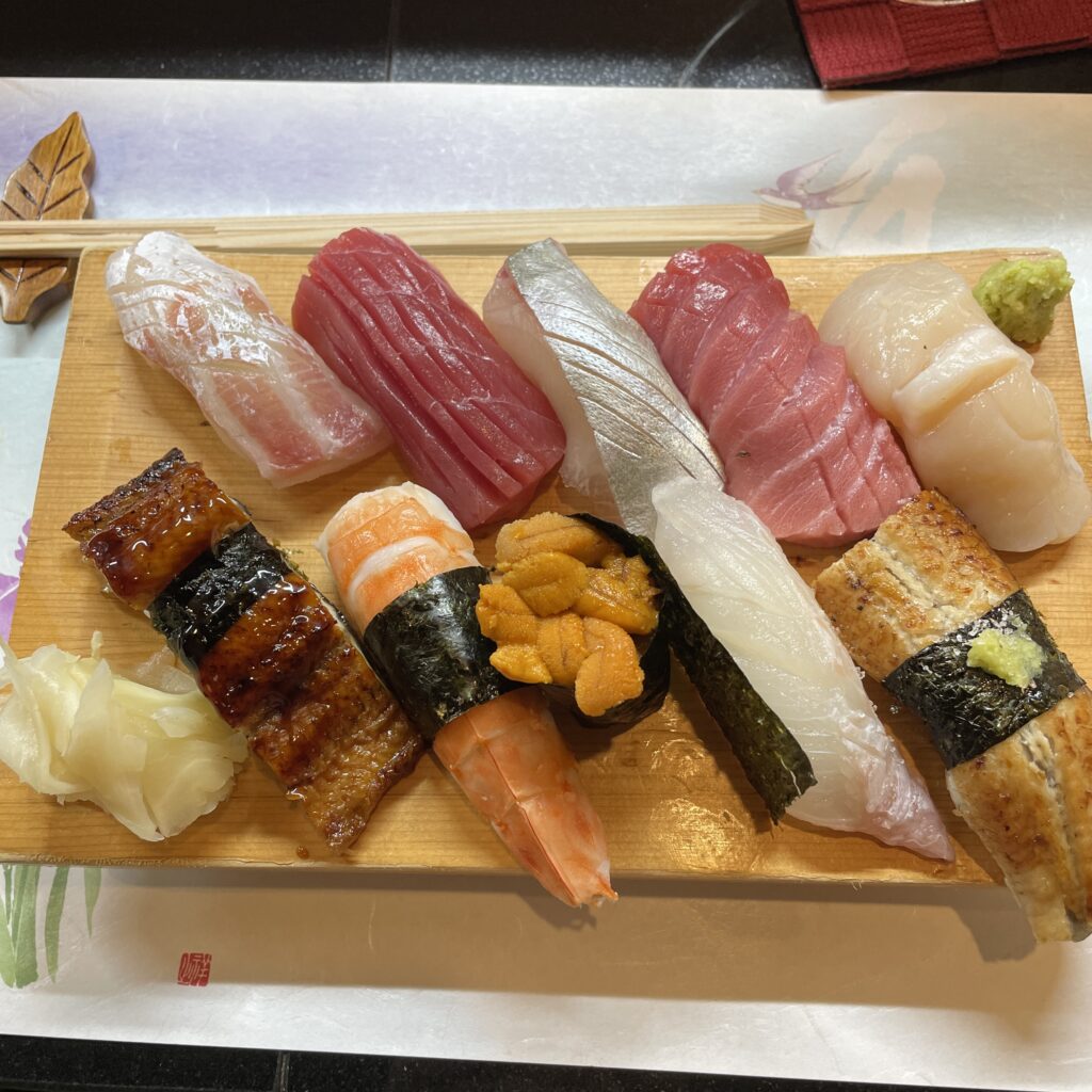 Beautifully plated fresh sushi selection with vibrant colors and delicate presentation, showcasing authentic Japanese cuisine.