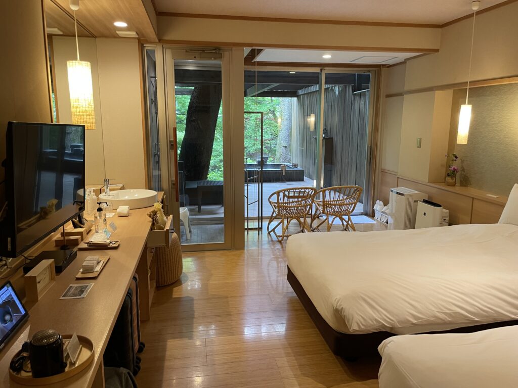 Spacious suite at Hakone Gora Byakudan with open-air private onsen and forest-facing windows