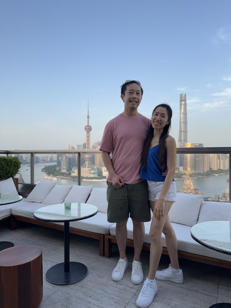 Skyline panorama from EDITION rooftop bar with Oriental Pearl Tower and Lujiazui skyscrapers in view
