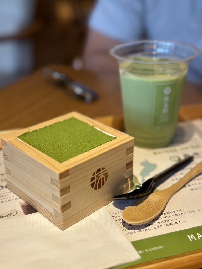 Delicious matcha tiramisu dessert with layers of green tea cream and sponge cake