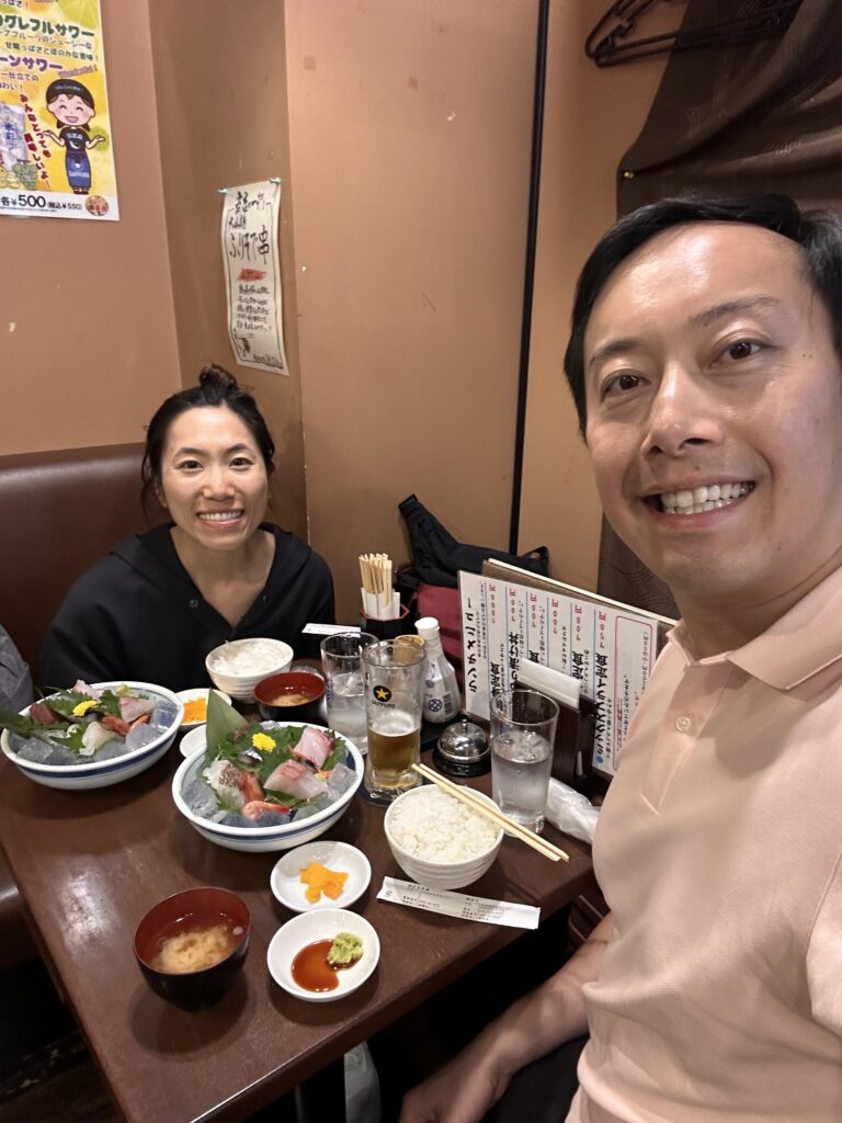 Dining at a local Japanese restaurant with beautifully presented sashimi platter
