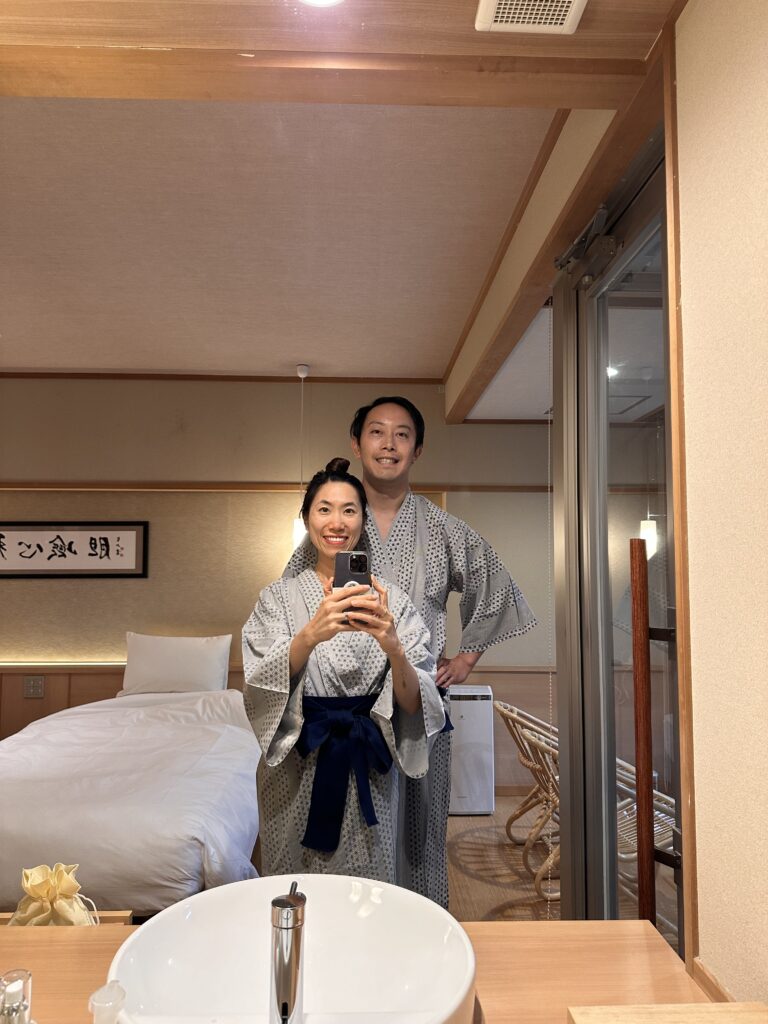 Couple wearing yukata in their double room at Hakone Gora Byakudan