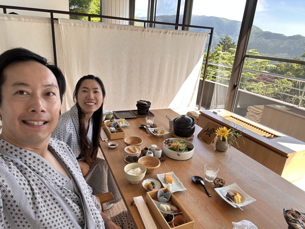 Couple enjoying delicious Japanese breakfast in Hakone
