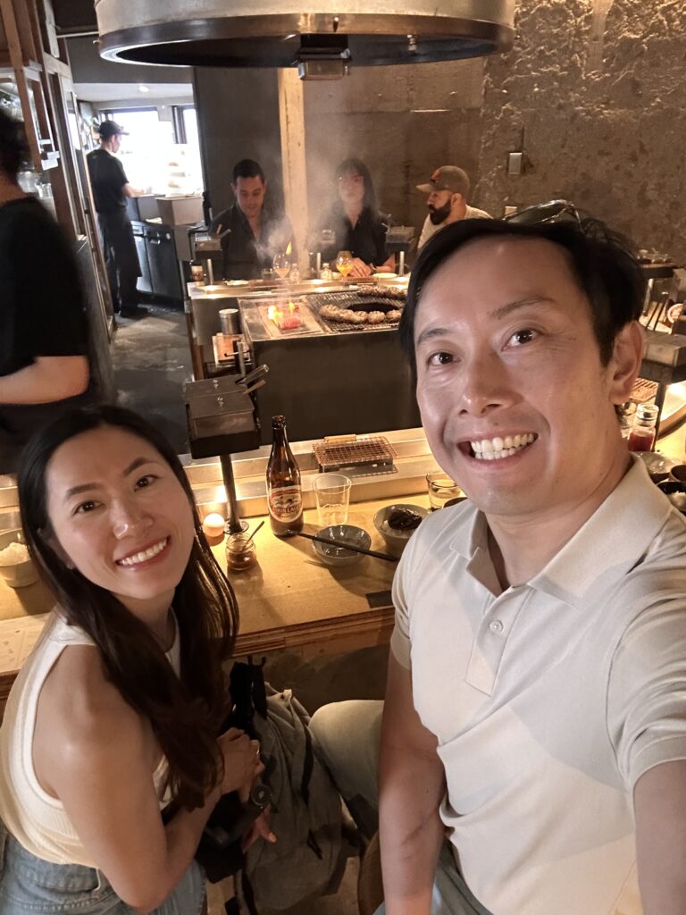 Couple enjoying lunch at Hikiniku To Come in Shibuya Tokyo experiences