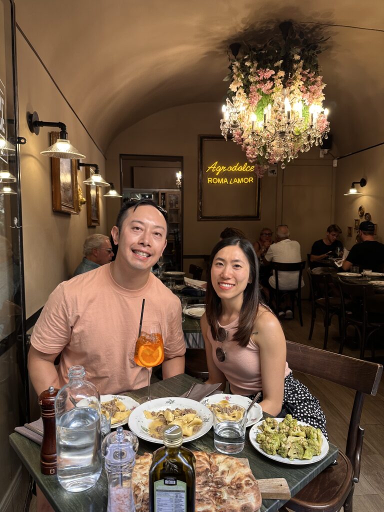 Guests enjoying traditional Italian dishes at Agrodolce Roma restaurant in Rome