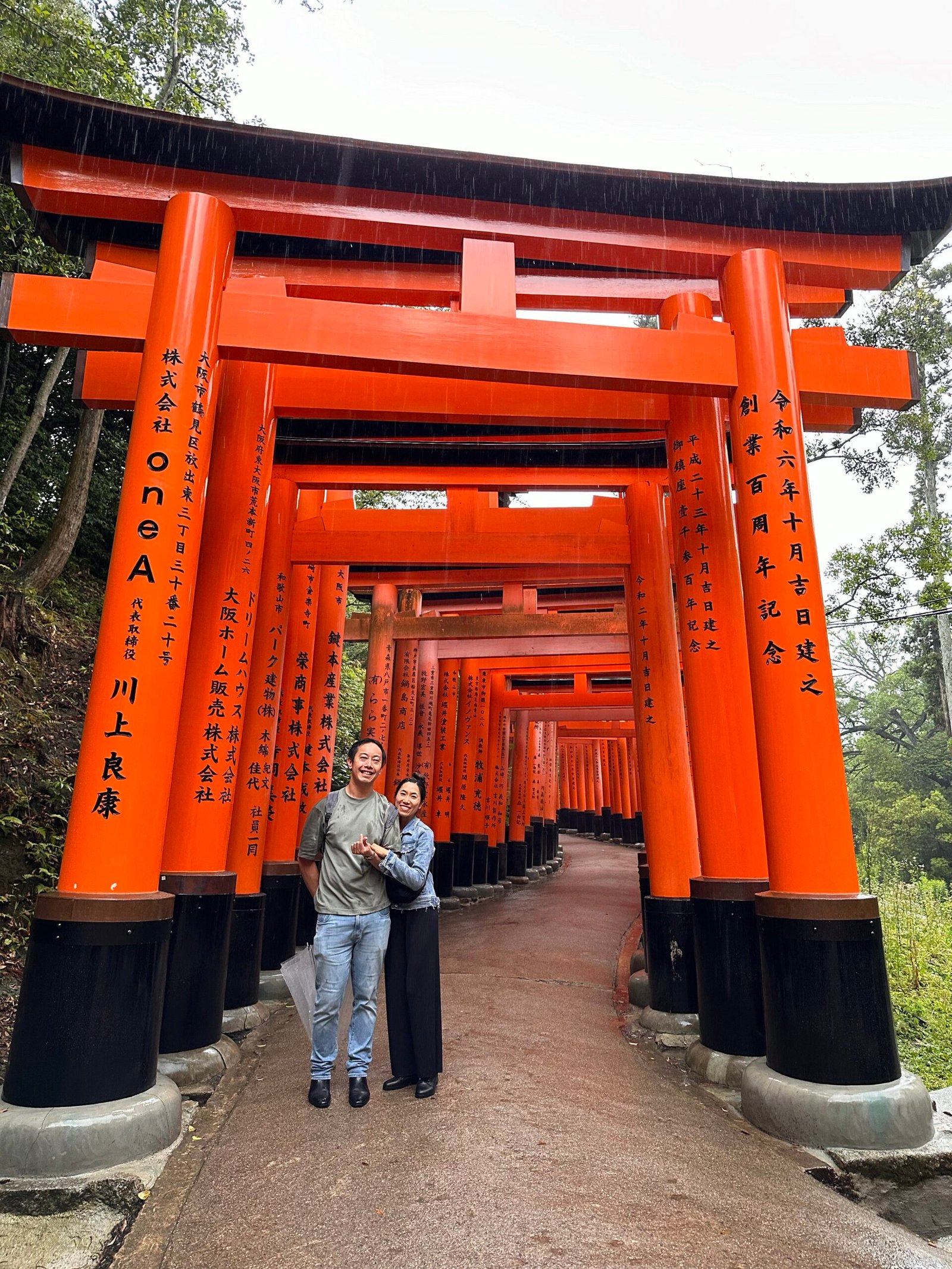 Thousands of Inari gates line up the path up Mount Inari in Kyoto, Japan